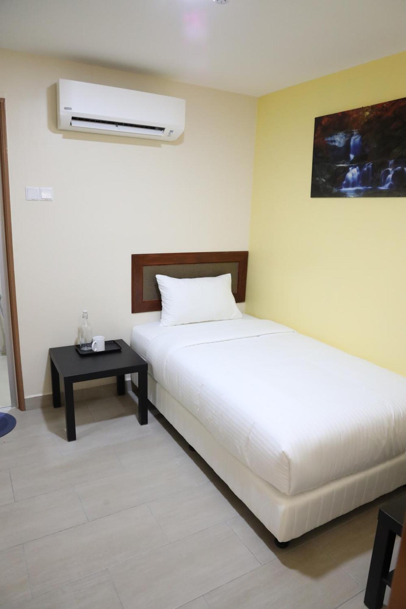 Capital O 90897 Island City Hotel George Town Buitenkant foto