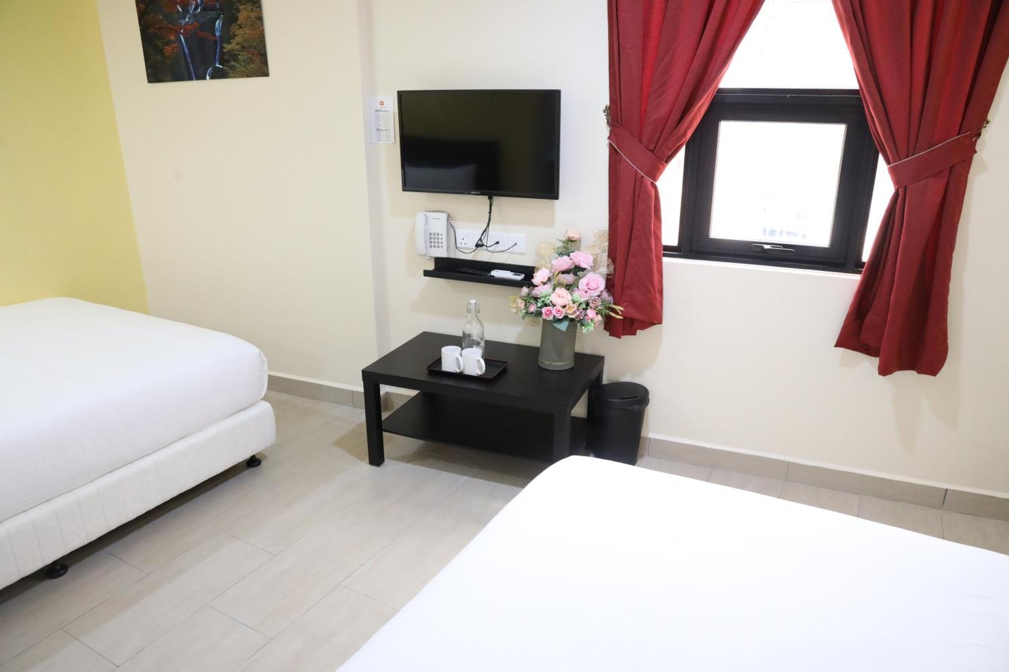 Capital O 90897 Island City Hotel George Town Buitenkant foto