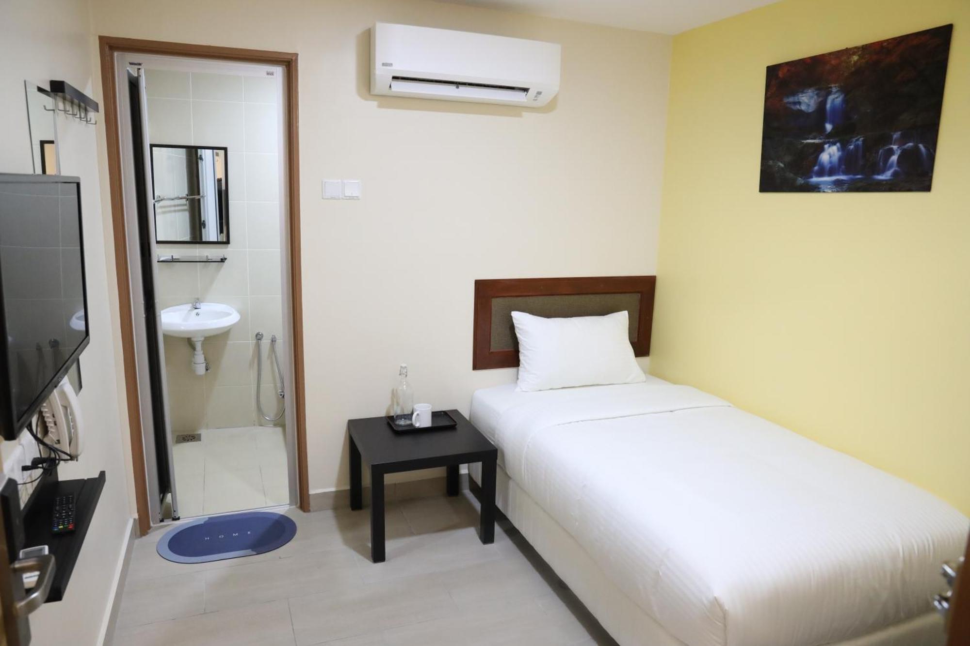 Capital O 90897 Island City Hotel George Town Buitenkant foto
