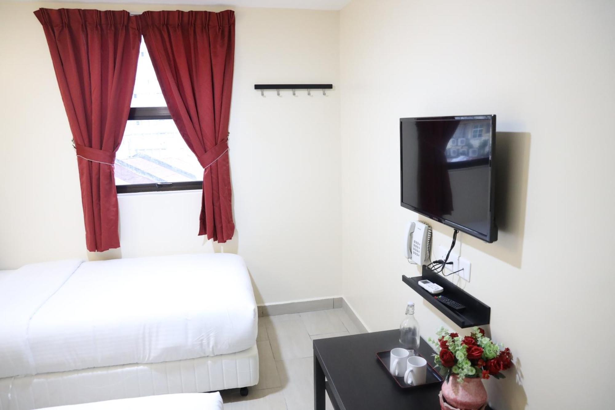 Capital O 90897 Island City Hotel George Town Buitenkant foto
