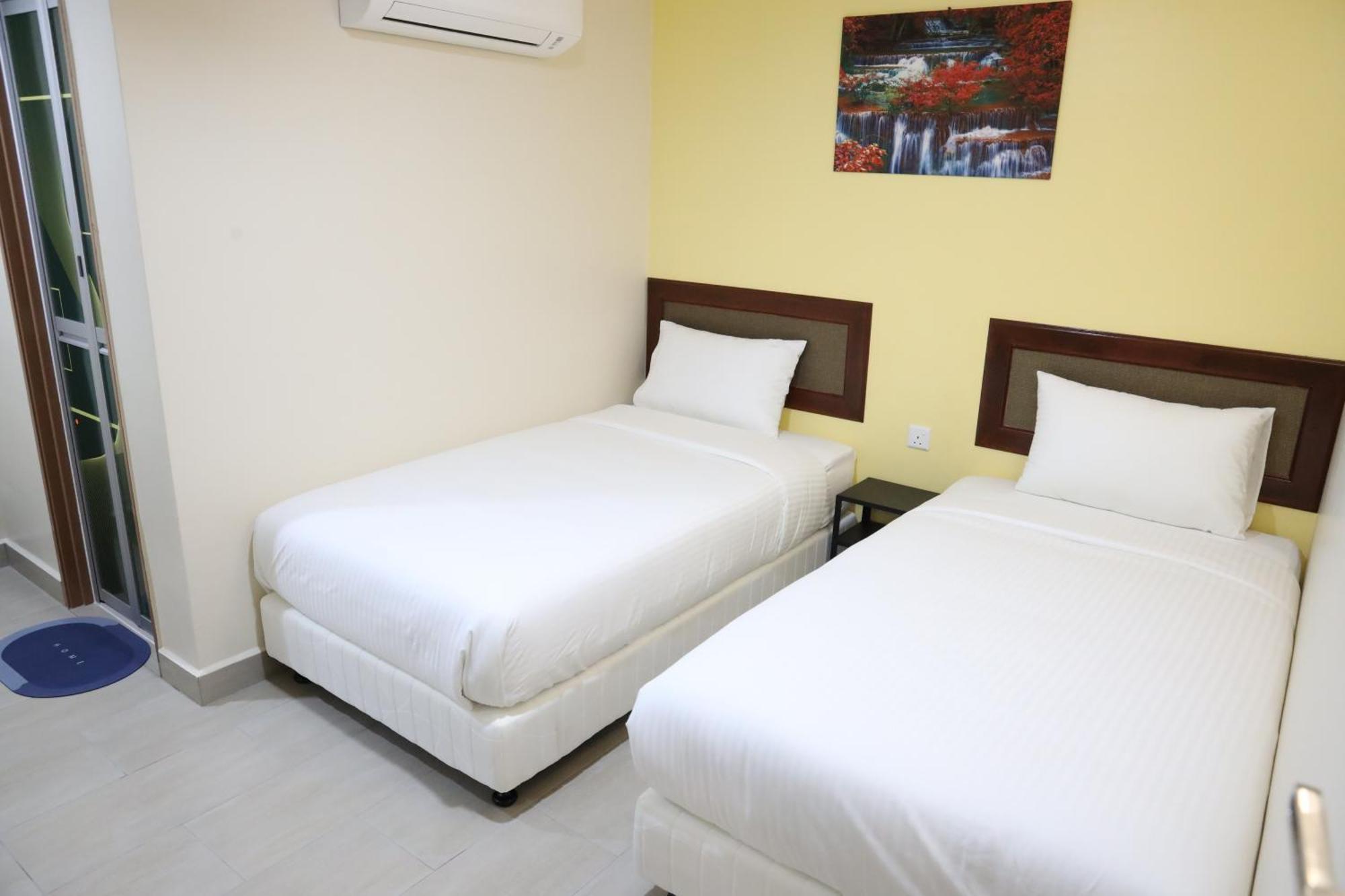 Capital O 90897 Island City Hotel George Town Buitenkant foto