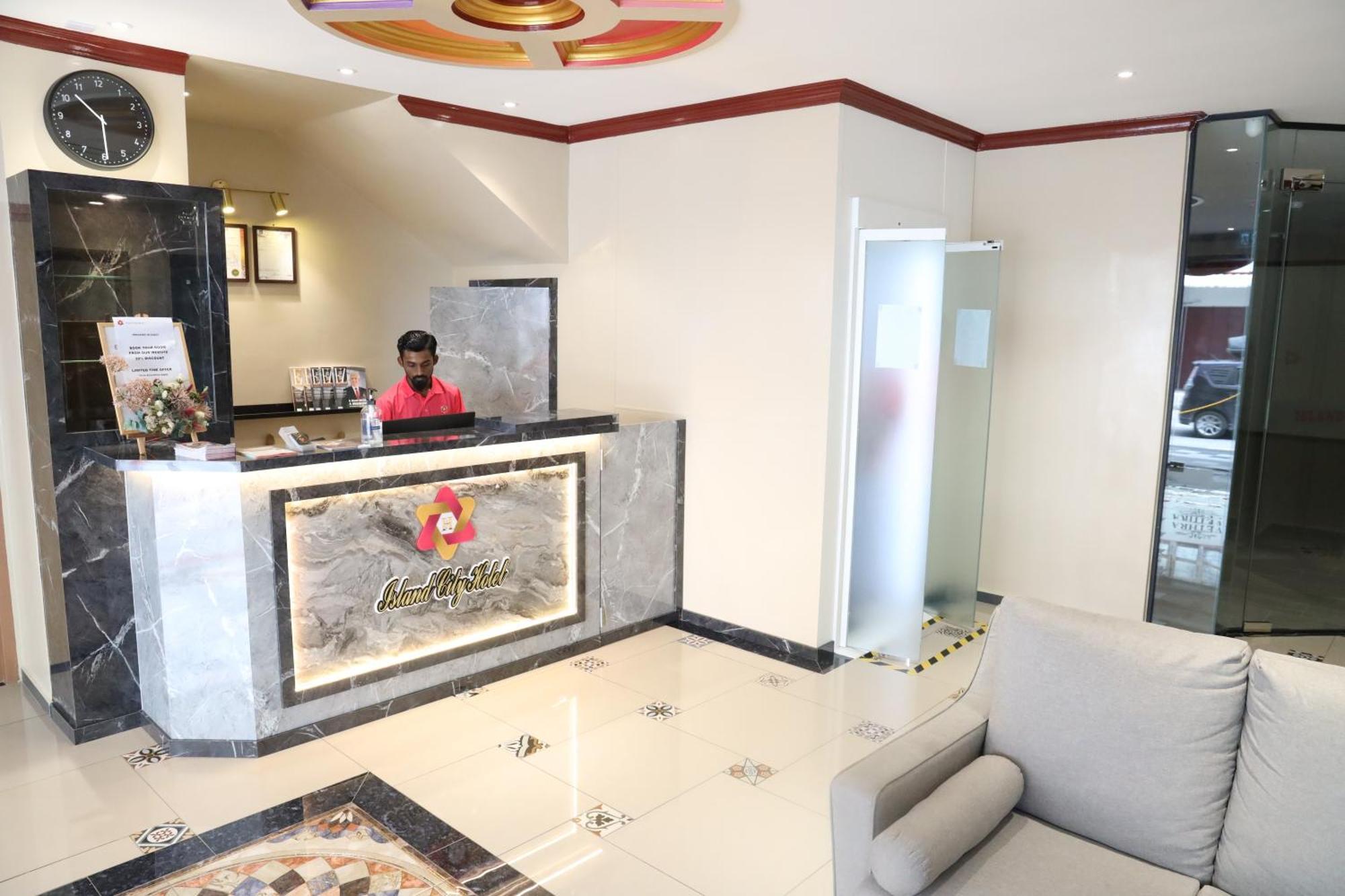 Capital O 90897 Island City Hotel George Town Buitenkant foto